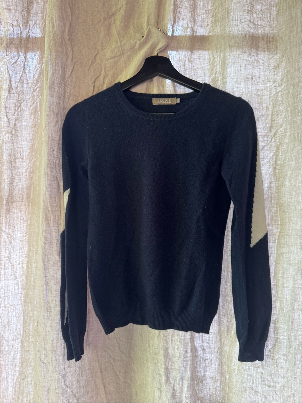 Brodie Cashmere Black Crewneck Sweater with Cream Lightning bolt Elbow Patches